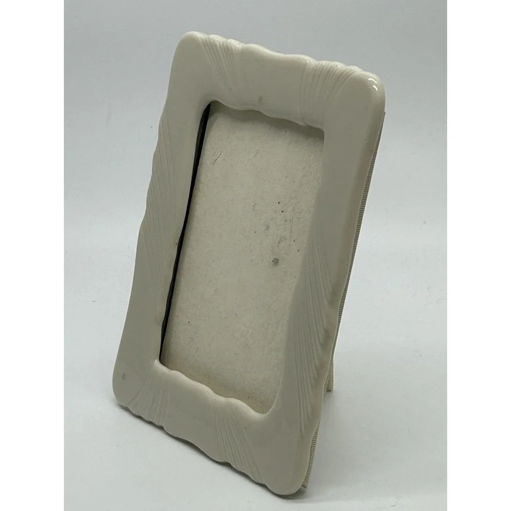 Lenox USA Porcelain Ivory Frame. 5x7 with a 3.5 X 4.5 Opening Perfect Condition